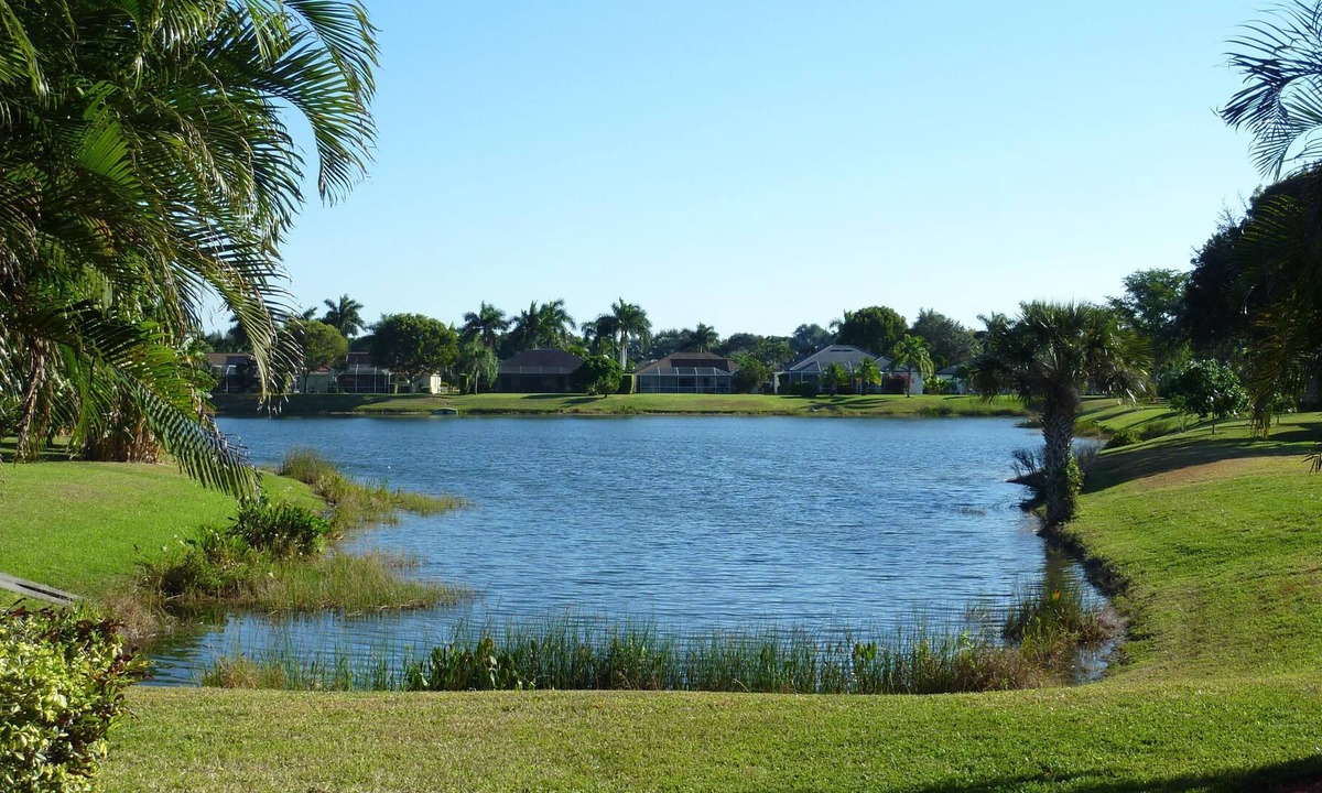 Central Naples House | 3 BR, 2 BA BEAUTIFUL LAKE VIEW SINGLE FAMILY HOME WITH POOL in BRIARWOOD