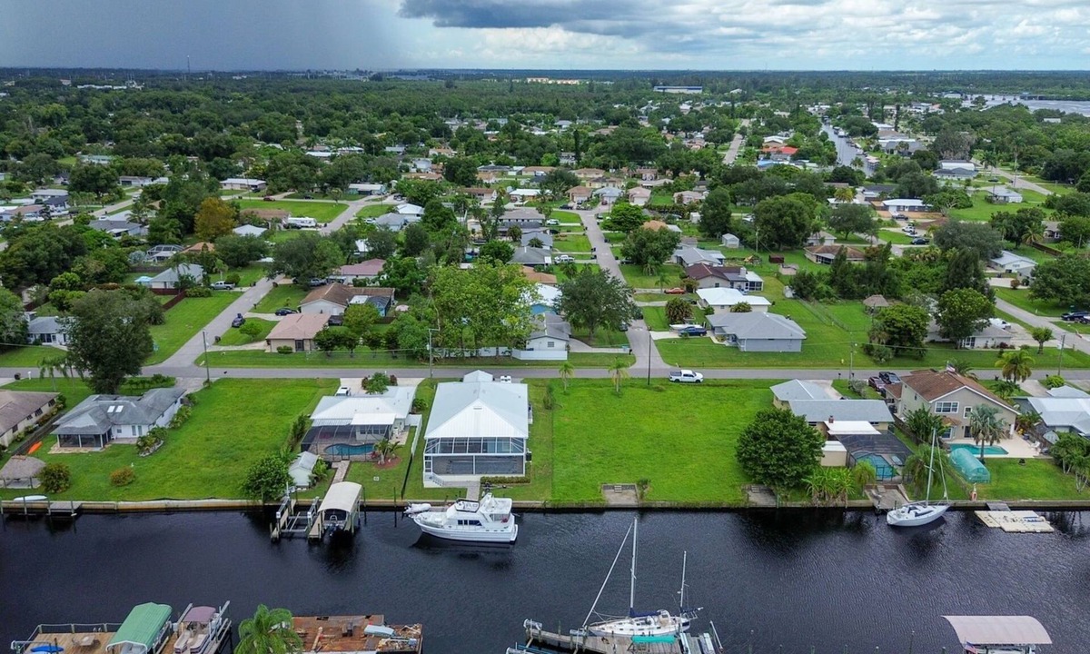Fort Myers Shores House | 3BR Home River Access Boating Screened Lanai