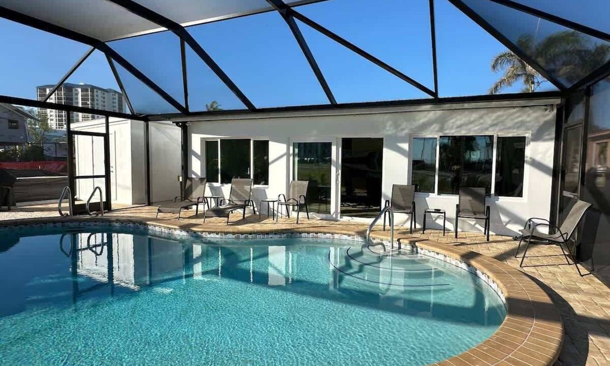 Mid Island House | 4850 Coral Pet Friendly Pool Home near Beach