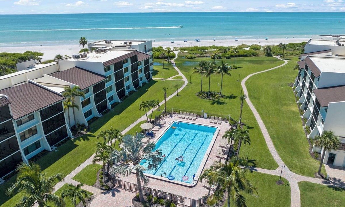 Sanibel Condo | Beachfront Loggerhead Cay 302— comforts of home, Heated Pool, Tennis, Pickleball & Bikes + Beach Gear. Weekly Stays.