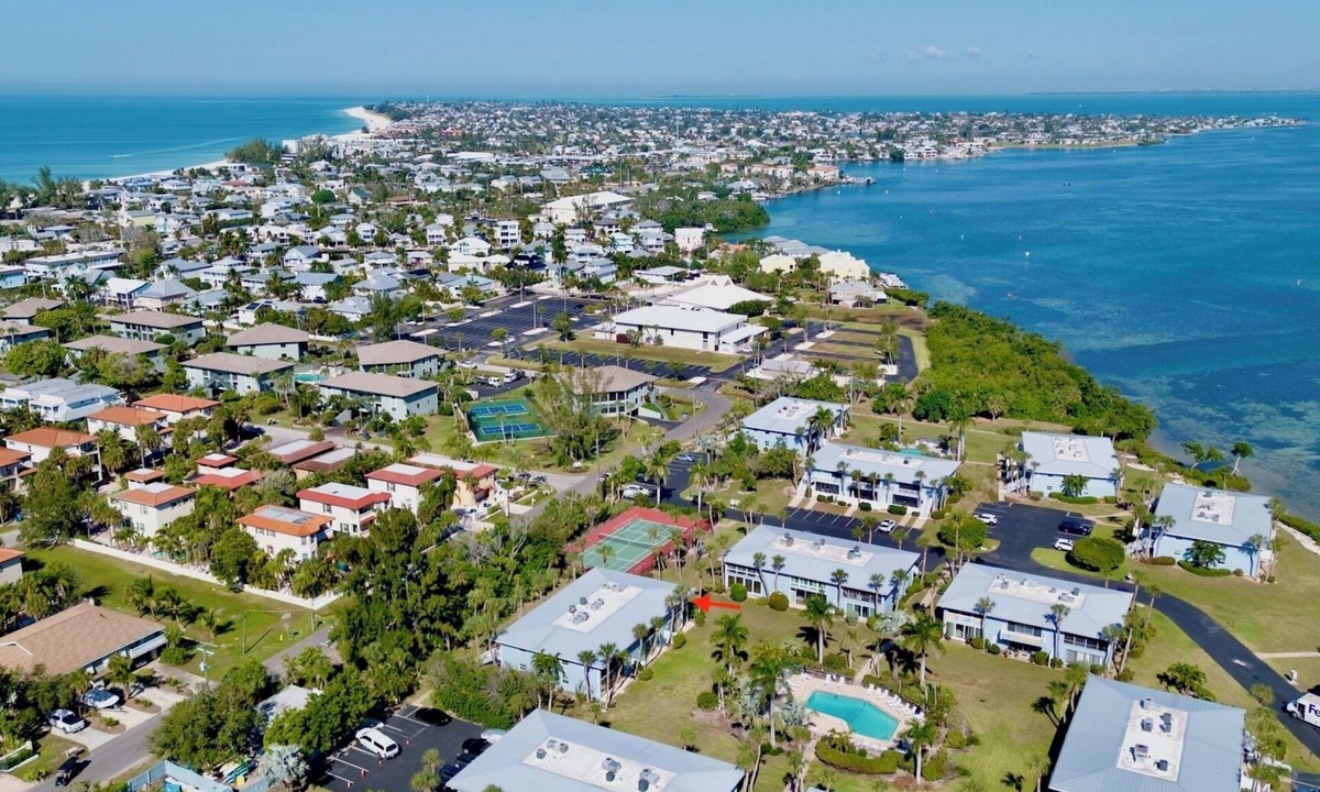 Holmes Beach Condo | Beachy Butterfly! Poolside Holmes Beach Stay!