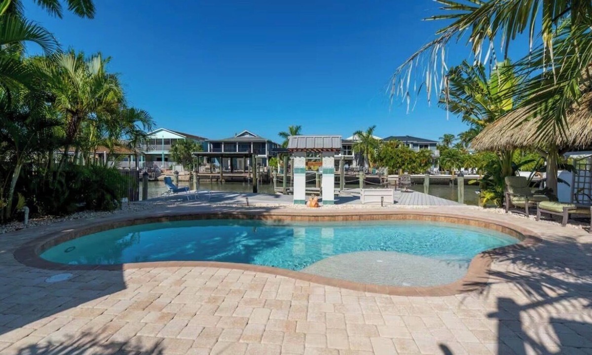 Fort Myers Beach House | Best Location on FMB! AWESOME SALTWATER POOL! WALK EVERYWHERE! 2nd floor unit