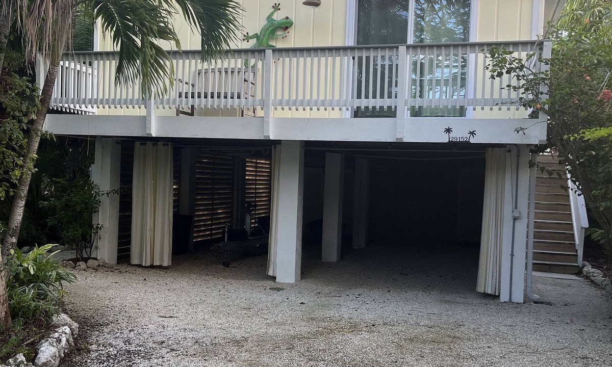 Eden Pines House | Big Pine Key Paradise Canal front fenced yard.