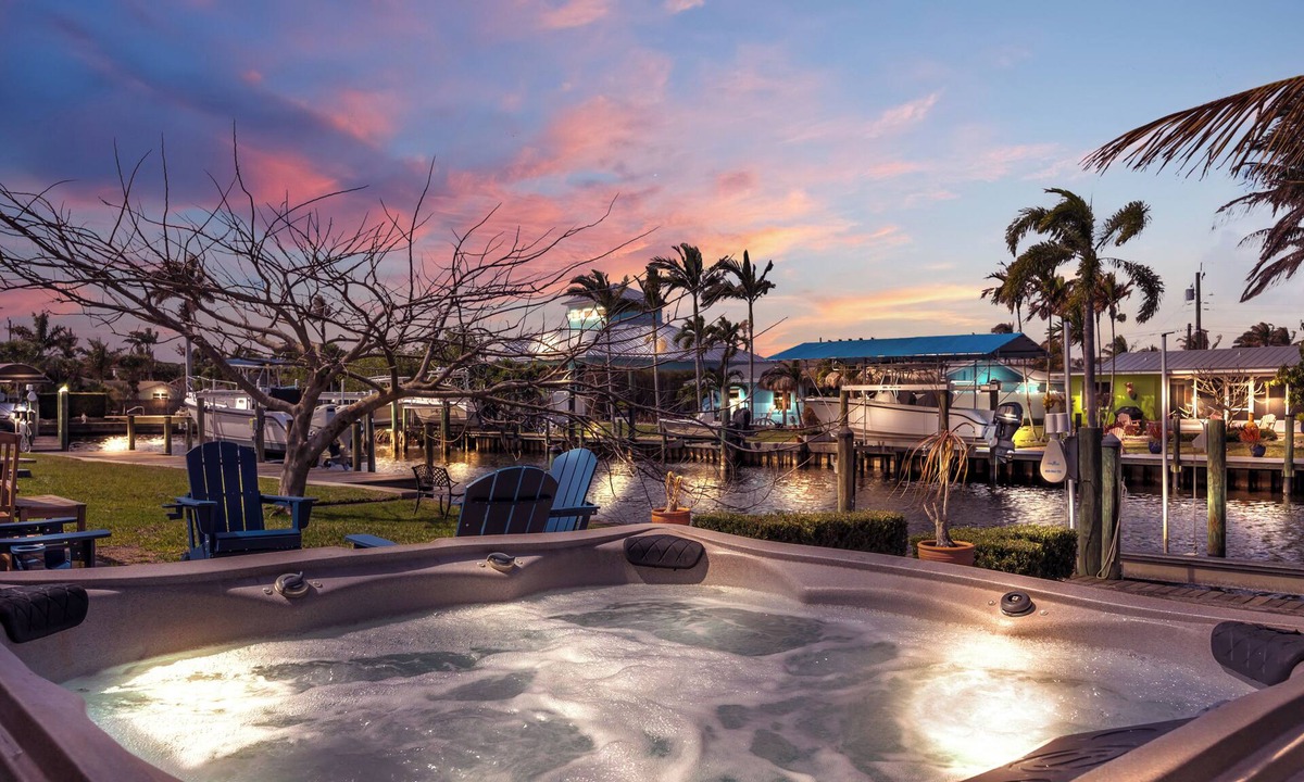 Palm City House | BOAT LIFT! Waterfront Home w/Hot Tub & Fire Pit!