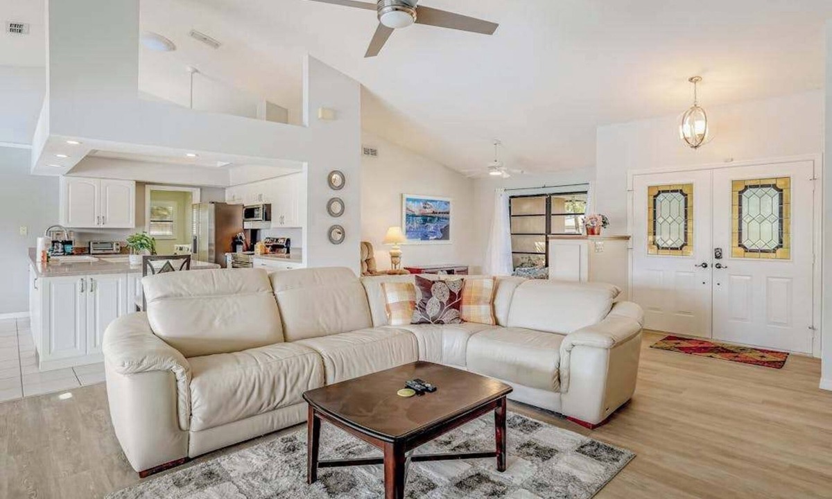 Pebble Beach House | Canal-front home with sandy beaches, golf courses, dock, & refreshing pool
