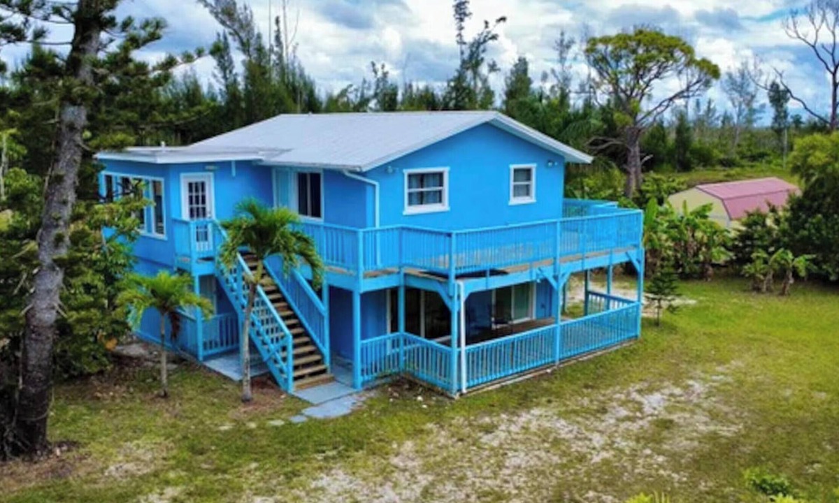 Flamingo Bay House | Charming 3-bedroom upstairs unit in a house with a shared pool in pine island