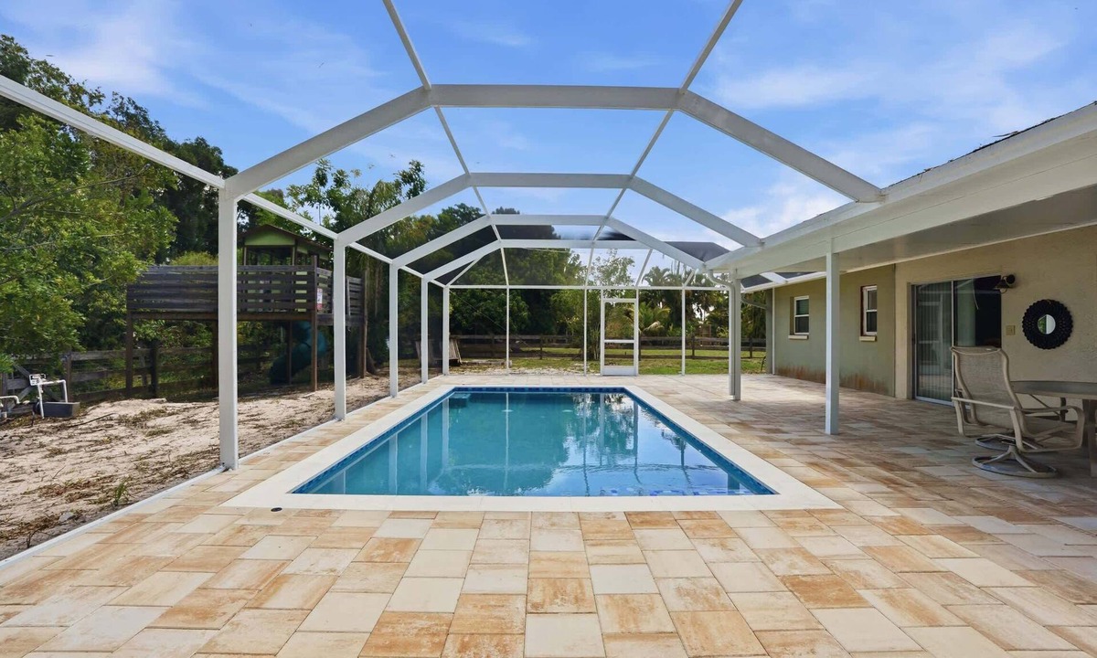 Bonita Springs House | Charming Outdoor Oasis: Private Yard & BBQ