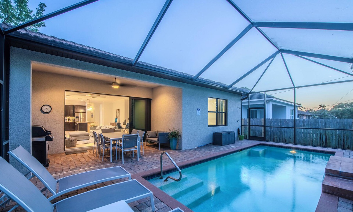Naples Park House | Coastal Clean Design 4 Bedroom/2 Bath + Saltwater Pool & Screened Lanai