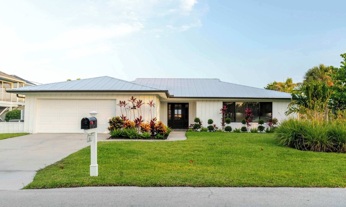 Shell Harbor House | Coastal Cottage on Canal, East End with Pool