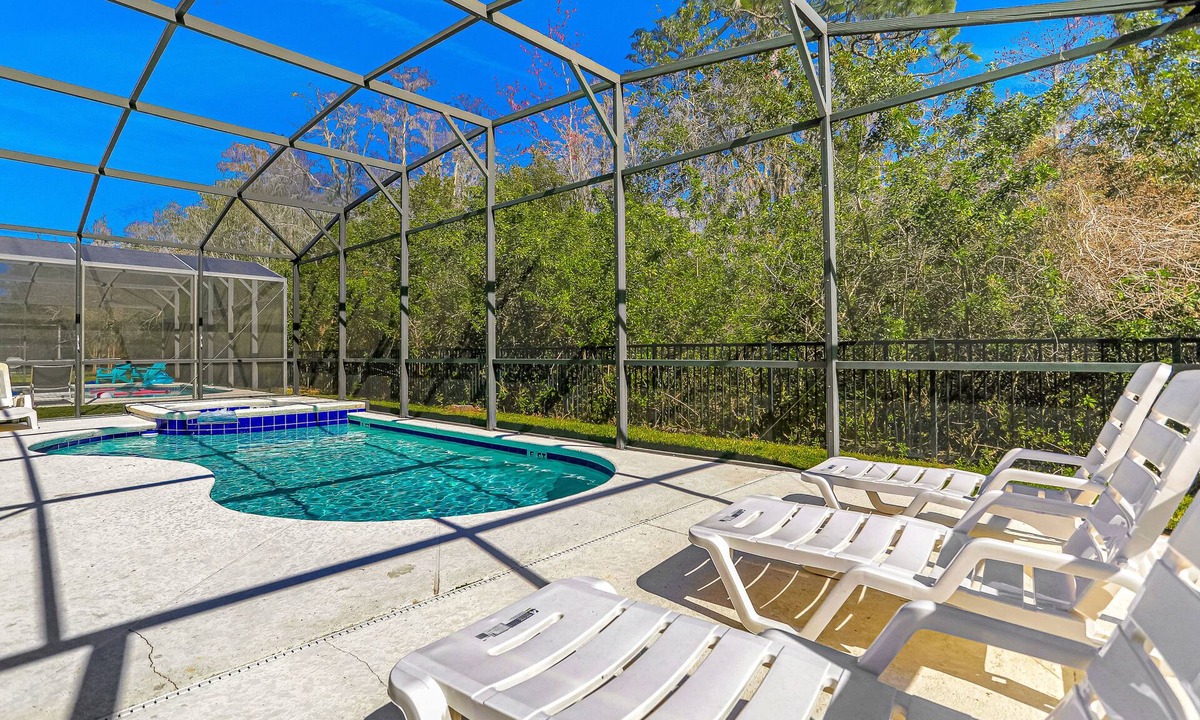Bellavida House | Colorful home with pool, patio, kitchen, washer/dryer, & game room