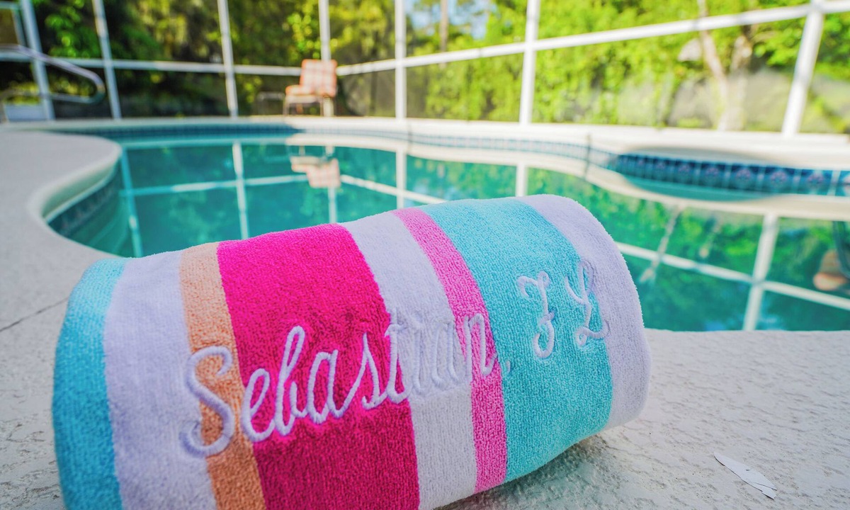 Sebastian Highlands House | Come Home to Paradise…. Screened in pool with covered lanai and hot tub