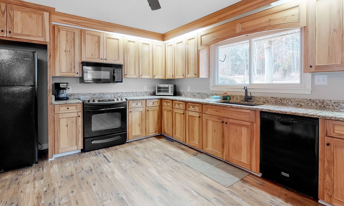 Leesville House | Cozy lakefront getaway with private dock & boat ramp + central AC, hot tub, WiFi