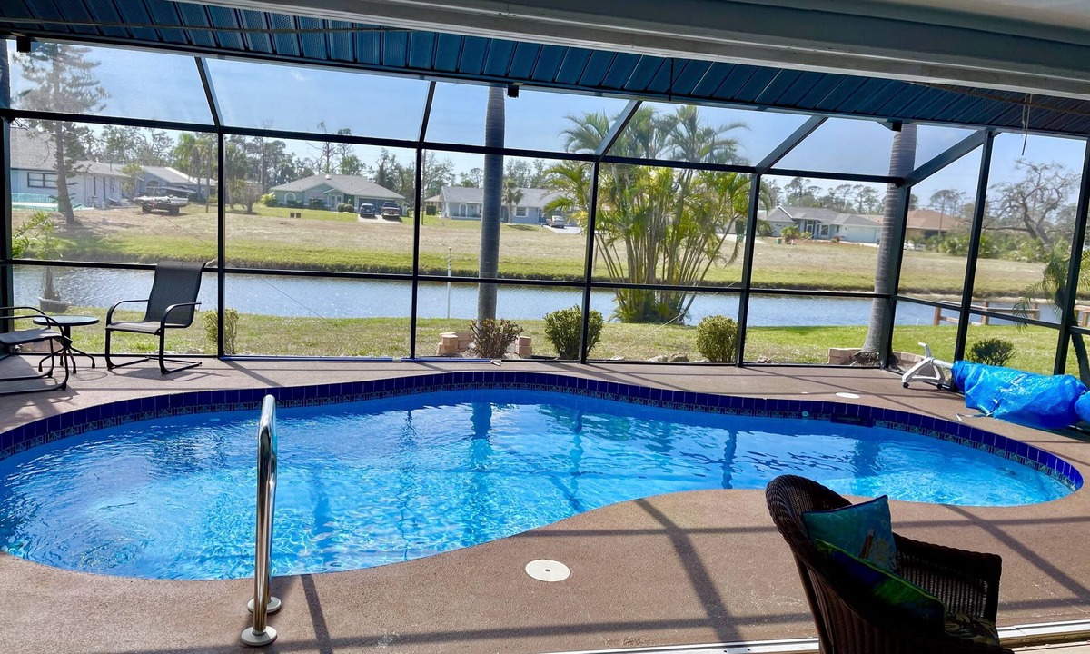 Pebble Beach House | cute house with pool with canal view