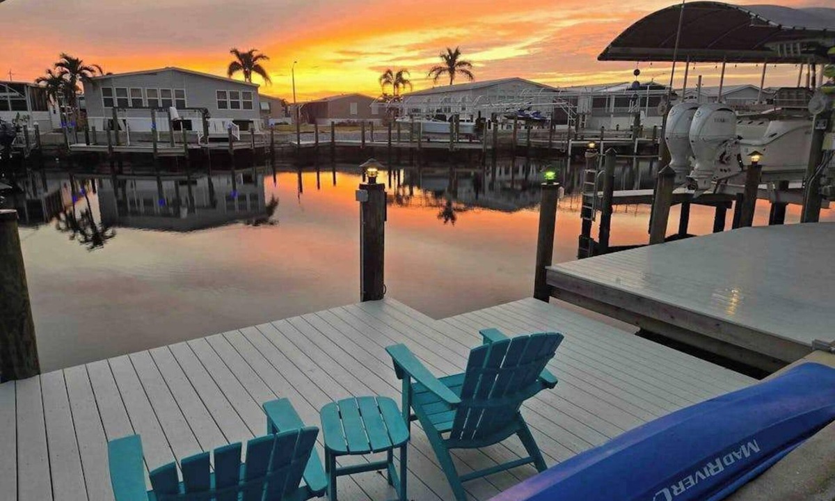 Saint James City House | Dog-friendly, canal-front getaway with a dock, screened lanai, & washer/dryer