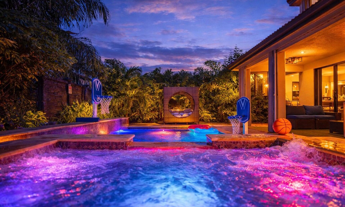 Tamiami House | Glow Lakefront Villa: 4K Cinema, Heated Pool & Spa - Sleeps 12, 5BR