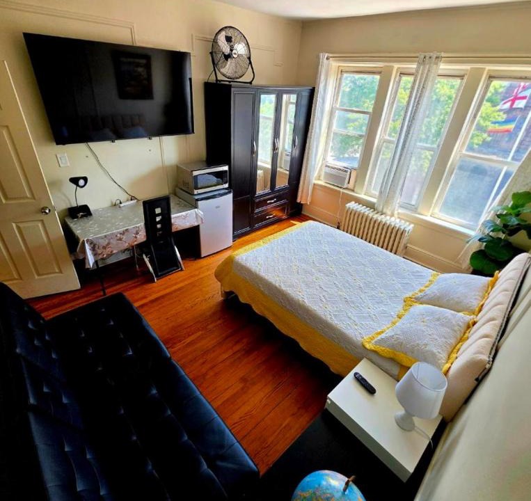 Paterson House | Habitación Privada Práctica con TV de 65 pulgadas en zona comercial muy activa