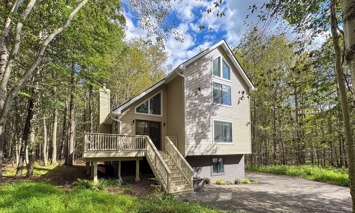 Gouldsboro House | Hot Tub & Game Room fun at this Scandi cabin! Enjoy 3 lakes, pools, and beaches. Modern design meets forest bliss—2 hrs from NYC/Philly. Level 2 EV Charger, fire pit, and sunroom. The perfect Poconos escape for families and adventure.