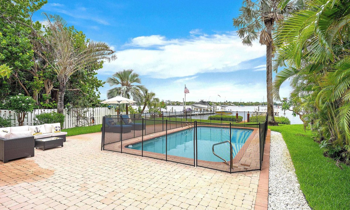East Ocean Ave House | Intracoastal Vista I – Waterfront Retreat with Private Boat Dock & Pool