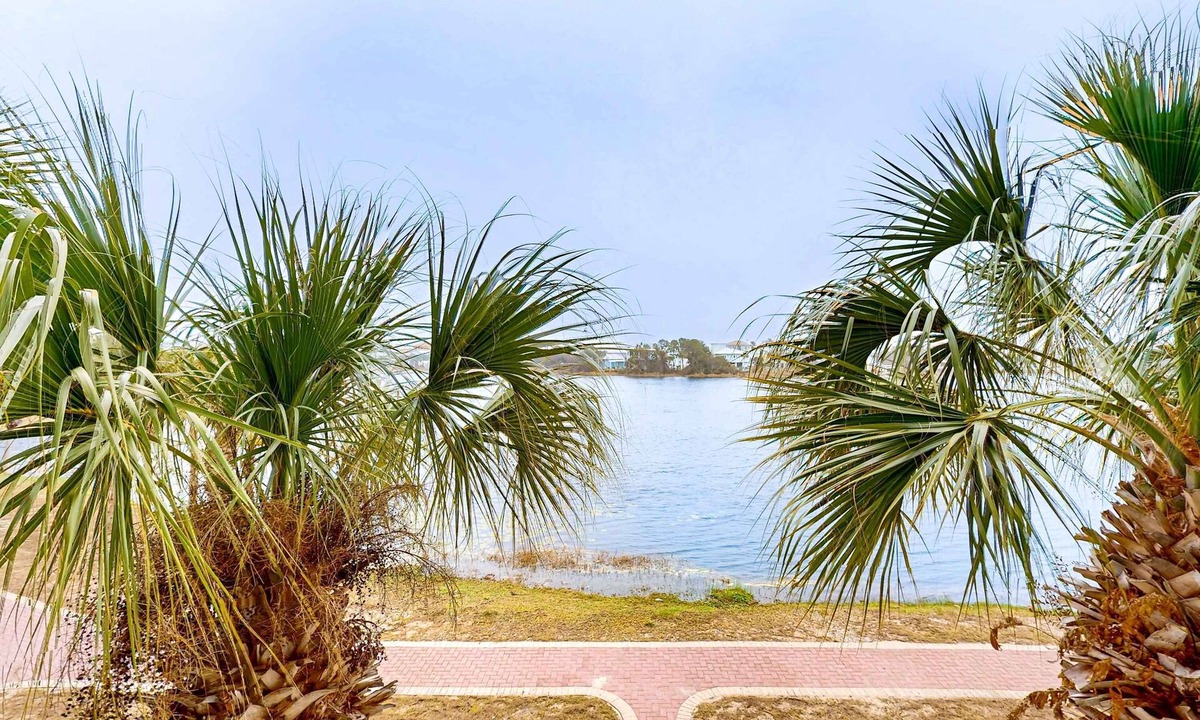 Sunnyside Apartment | Lakefront resort condo with heated outdoor pool, hot tub, balcony, lake views