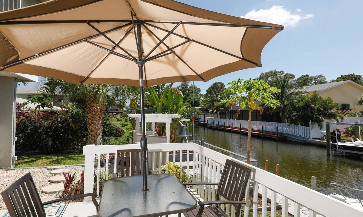 Grove City Condo | Lemon Bay Waterfront Condo w Patio, 5 miles to Gulf Beaches
