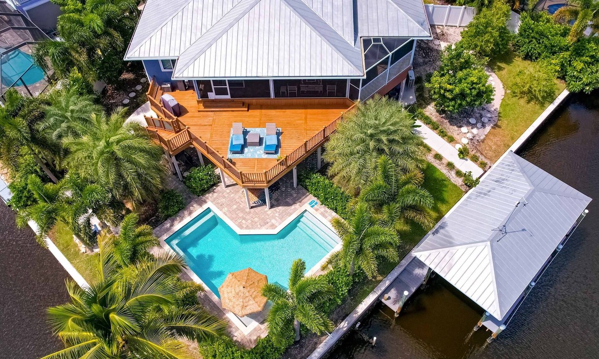 Saint James City House | Luxurious waterfront home, pool, boat dock, fillet station, private guest suite