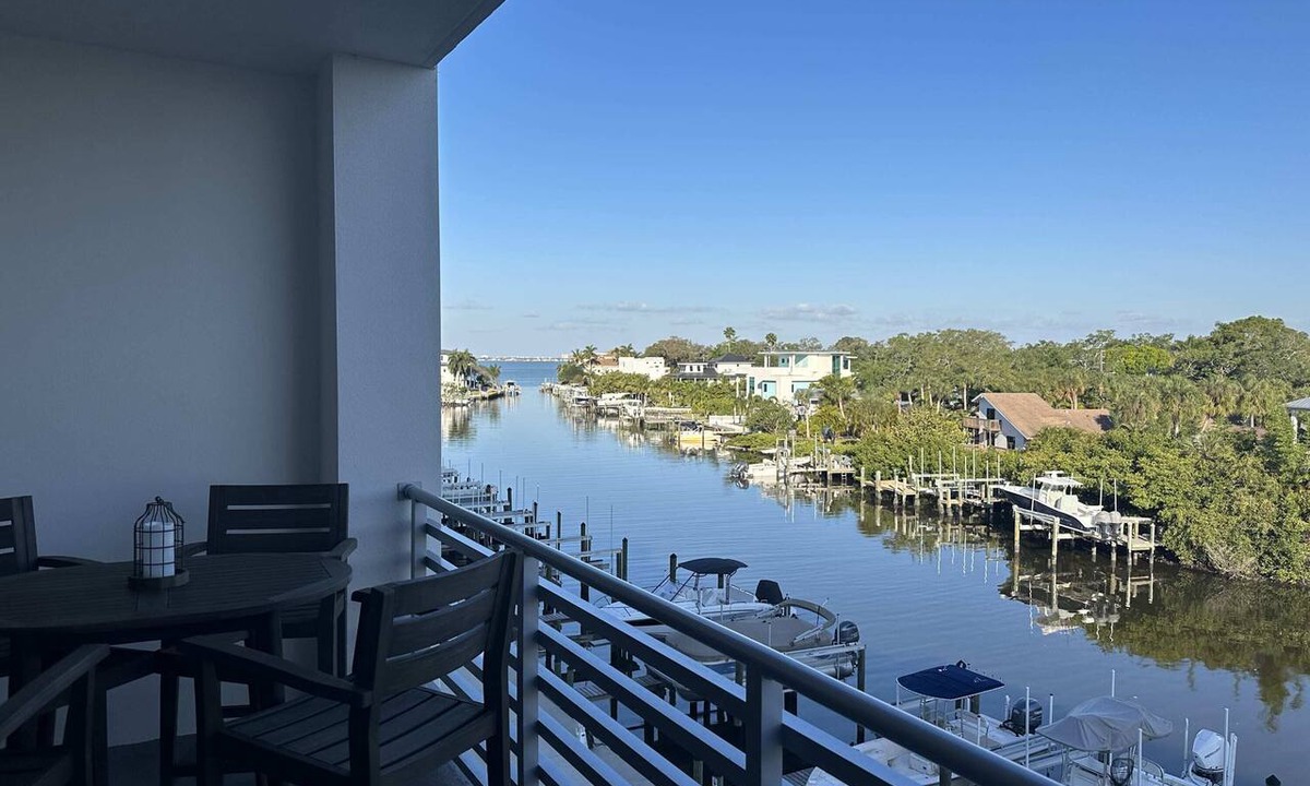 Central Sarasota Condo | Luxury 2 Bed 2 Bath Waterfront Condo with Patio Sunsets Gym and Parking