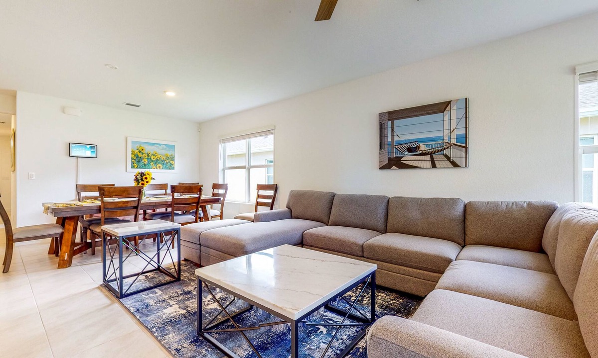 Stuart House | Modern Treasure Coast home with Peloton, EV charger, tennis, patio, & central AC