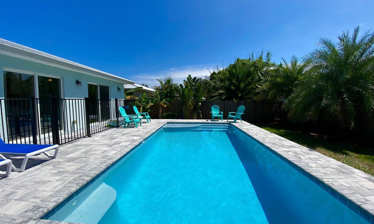 Butler Beach House | Mystical - Relaxing Heated Pool and Stylish Comfortable Home, Pet Friendly!