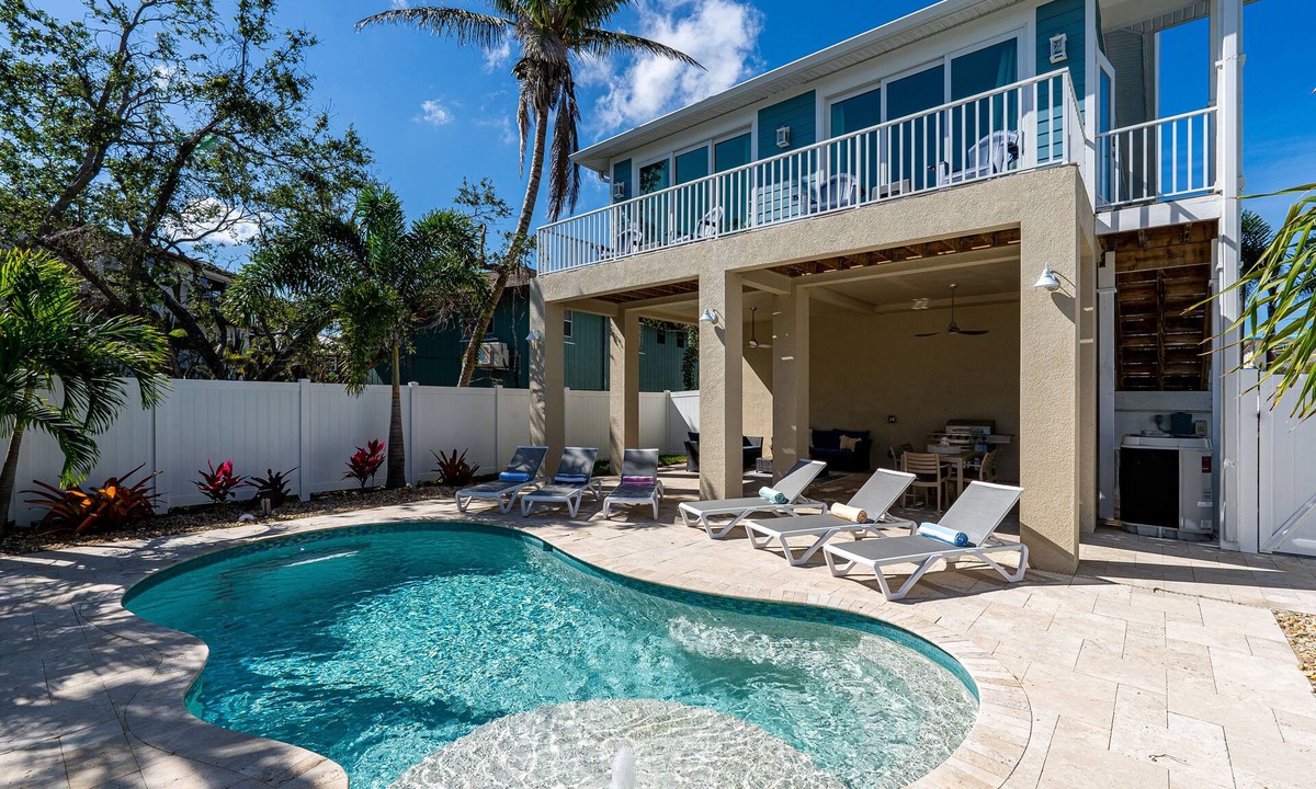 Mid Island House | New 4BR Oasis: Walk to Beach, Pool, Pet-Friendly!
