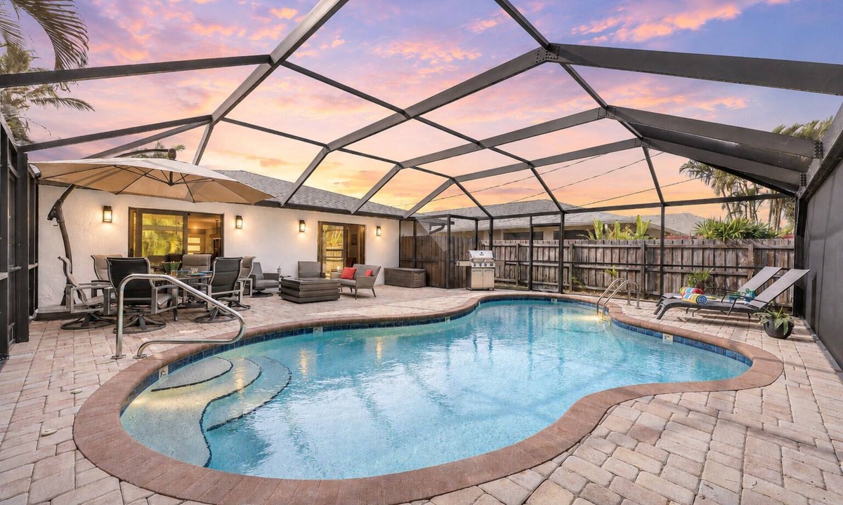 Naples Park House | New Listing! Paradise in the Sun - Heated Saltwater Pool/Spa, 1 Mile to Beach!
