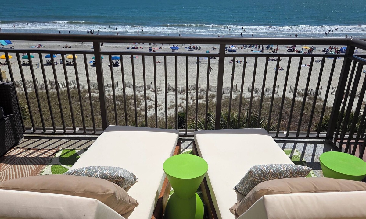 Myrtle Beach Apartment | Over-sized Luxury Balcony with teak loungers! Modern Style in the Golden Mile