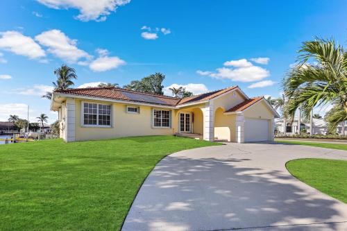 Marco Island House | Pet-friendly waterfront with pool and steps to beach