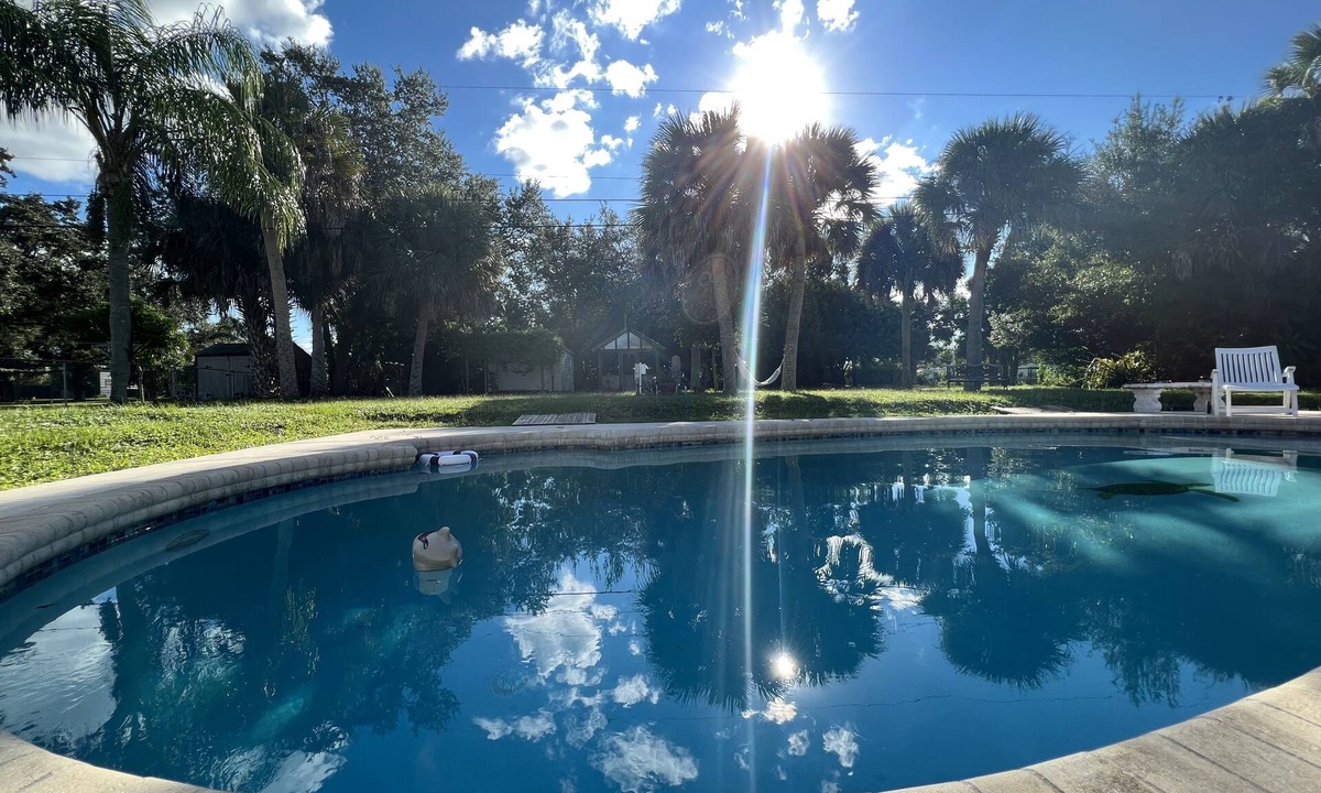 Melbourne House | Pool house(Heated pool) with Oasis garden near the beach Location! Location!
