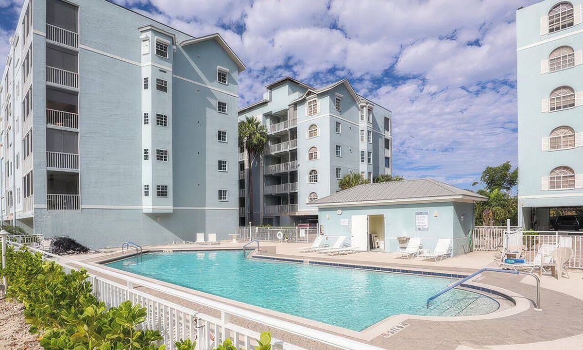 South Island Condo | Relax In The Sunshine! Lovely 2B/2B Vacation Condo w/All Weather Lanai, Walk To Beach, Resort Pool!