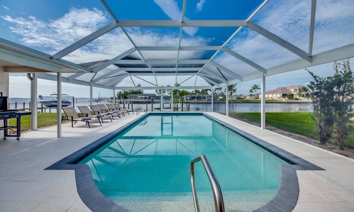 Yacht Club Villa | Riverview at Dolphin Drive - A gem in the Yacht Club area with stunning sunsets.