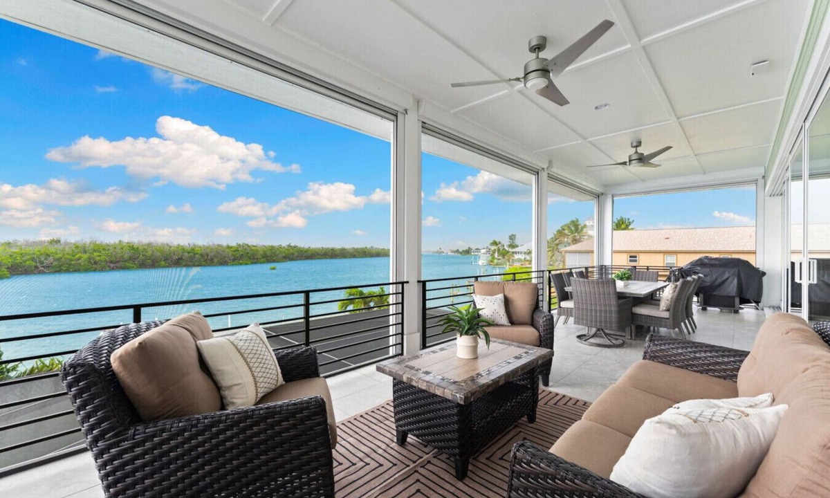 Bonita Springs House | Seafoam Serenity - Bayfront Retreat w/Dock, Pool + 1 Min Walk to Bonita Beach