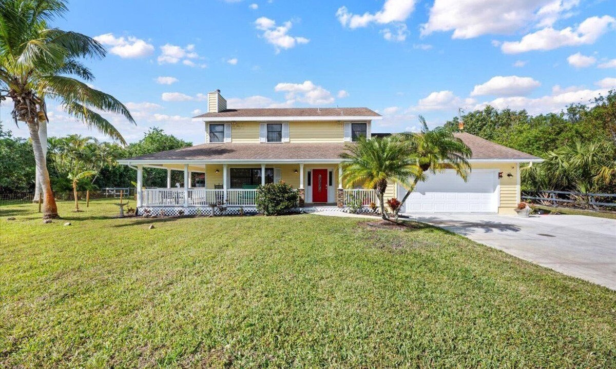 White City House | Secluded 2.5 Acre Farmhouse with Wrap-Around Porch