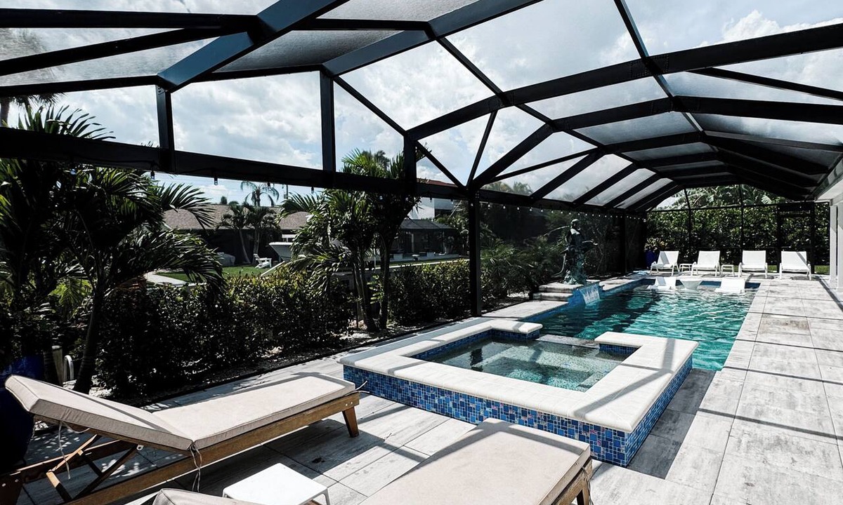 Bonita Springs House | Spacious 4BR/3BA retreat. Heated Pool + Hot Tub, just 5 Miles to Bonita Beach
