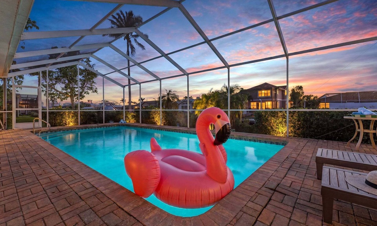 Pelican House | Spacious, Heated Pool Home w/Gulf Access- Villa Sunset Point - Roelens Vacations