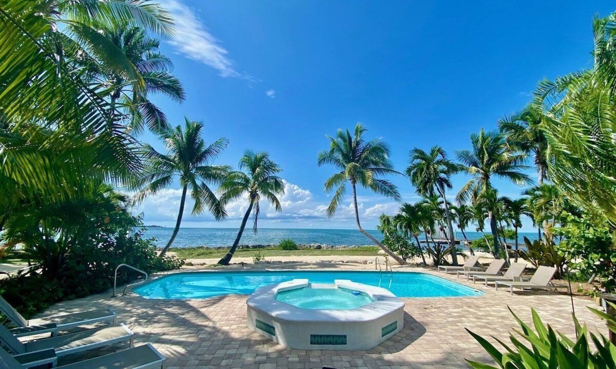 Marathon House | Sunsets in Paradise~ Gulf Front Pool Home, 22' Dock, Kayaks, Bikes & Paddleboards