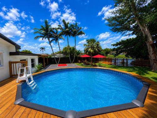 Kendale Lakes Villa | Tropical Lakehouse Escape Pool and Lakefront