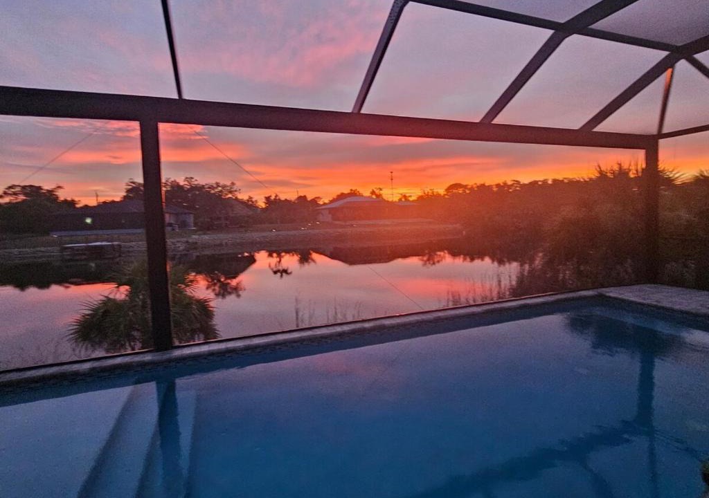 South Gulf Cove Villa | Waterfront Home 4BD 3BA Heated Pool Gulf Access Near Beaches Golf Pets Ok