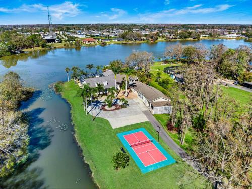 Westchase House | Waterfront Pool Pickleball Basket Sleeps 18