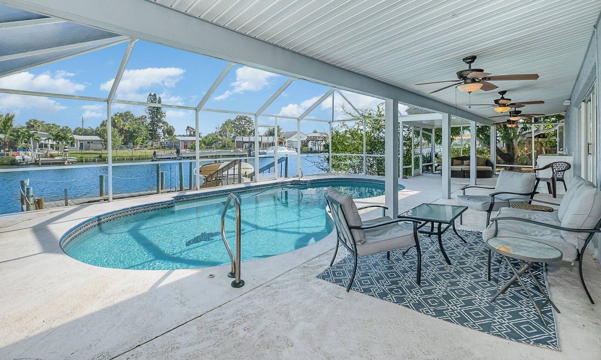 Waterway Estates House | Waterfront villa with pool- sleeps 8