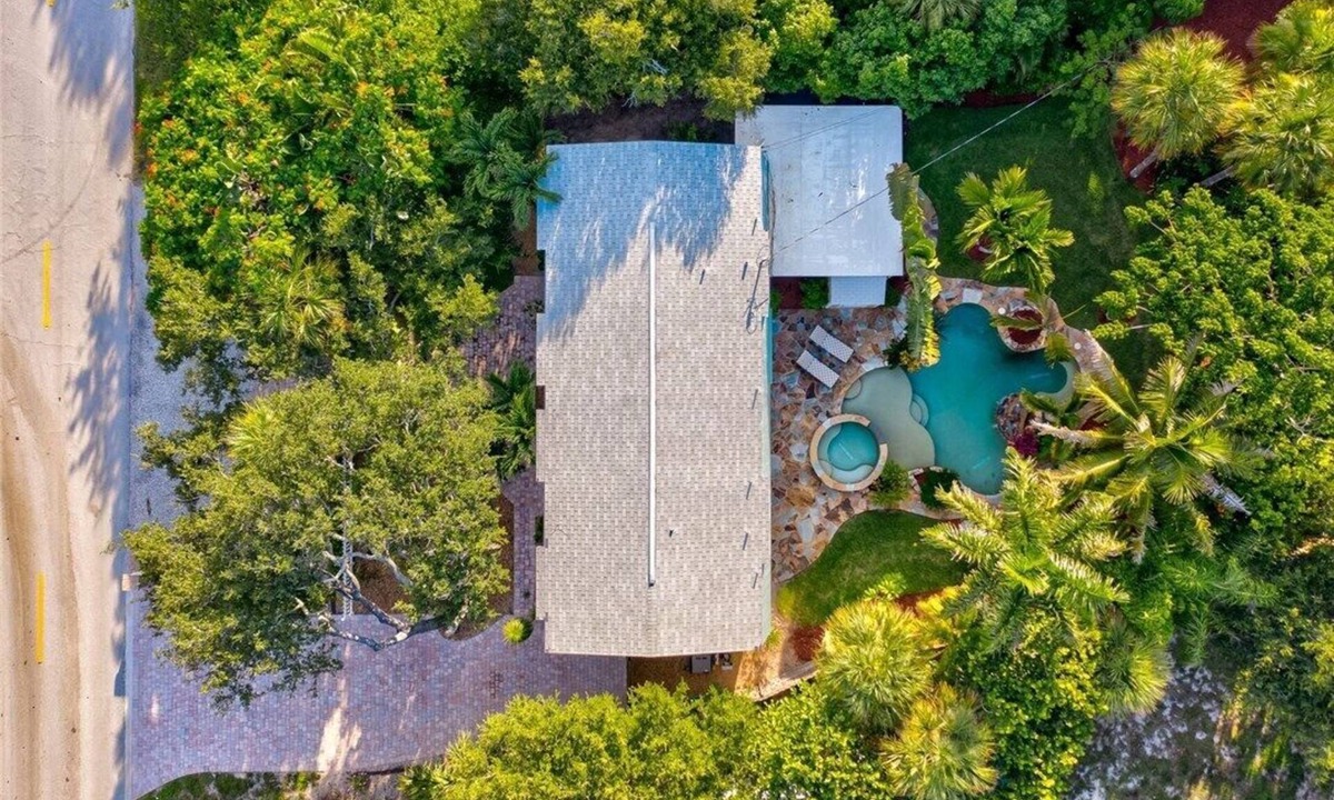 Central Beach House | Welcome to your tropical oasis steps from the beach!