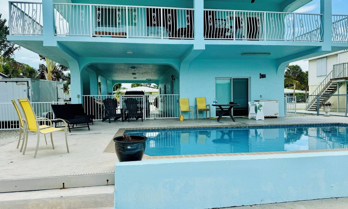 Marathon House | Yellowtail Island Retreat - 3BR Keys Home w/Pool, Dockage, Porch & Canal Access