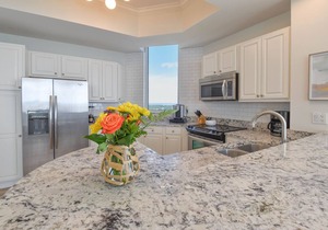 Upscale crisp, coastal beachfront condo w/private balcony!