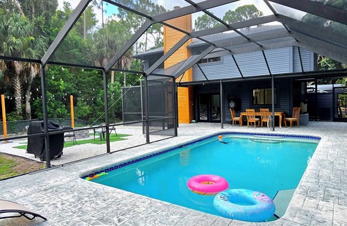 Naples House | 1 Acre Oasis · Pool, Billiards & Volleyball. Great location.