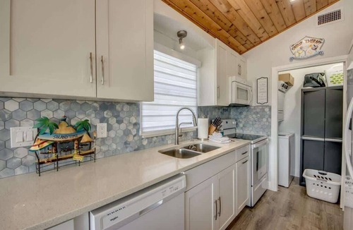 Mid Island House | 113 Gulfview Pool Oasis Steps from the Beach