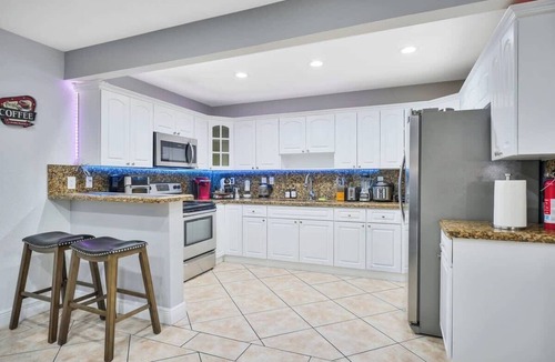 Coral Way House | 2 Homes, King Beds, for 23 NearBeach/Airport